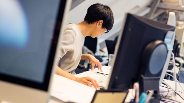 Developer working on an Apple Mac