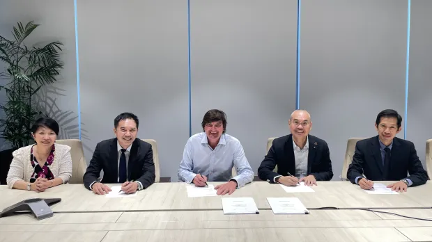Signing ceremony for Howden's acquisition of AEGIS