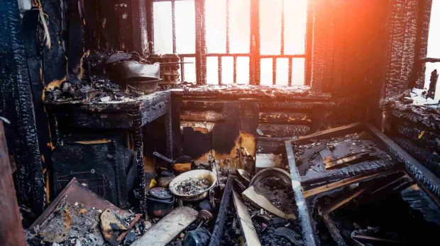 Fire and Allied Perils - burned out house The interior of a burnt house, totally destroyed by fire.