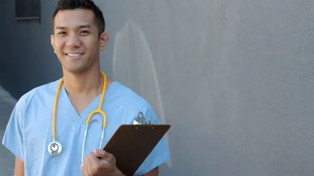 Smiling young male doctor Smiling young male doctor