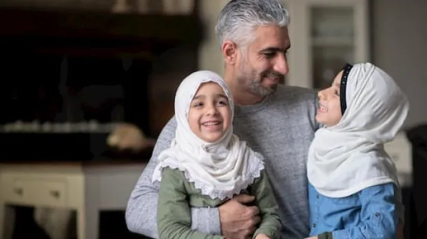 Man with two daughters