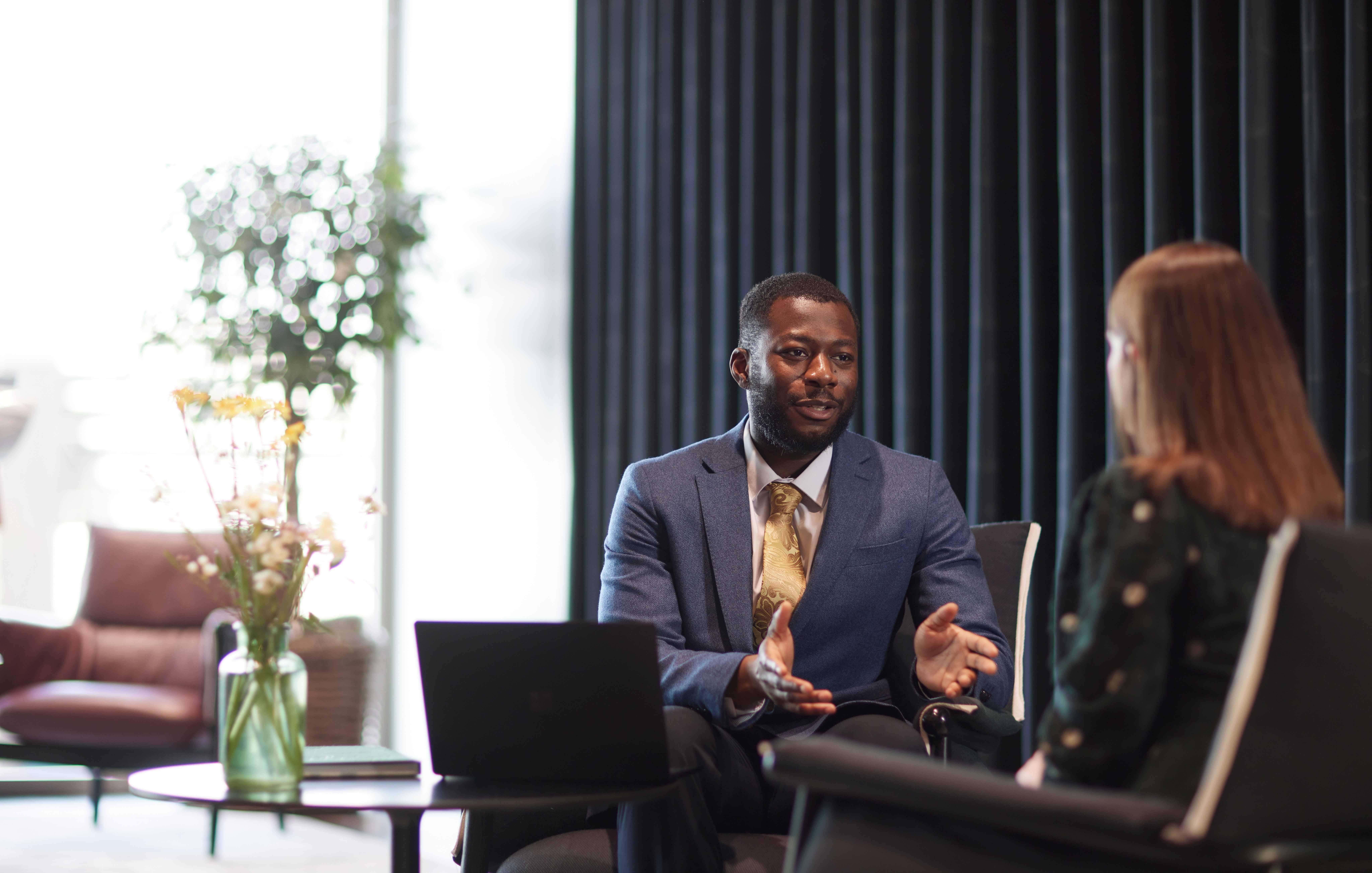 Two people in conversation