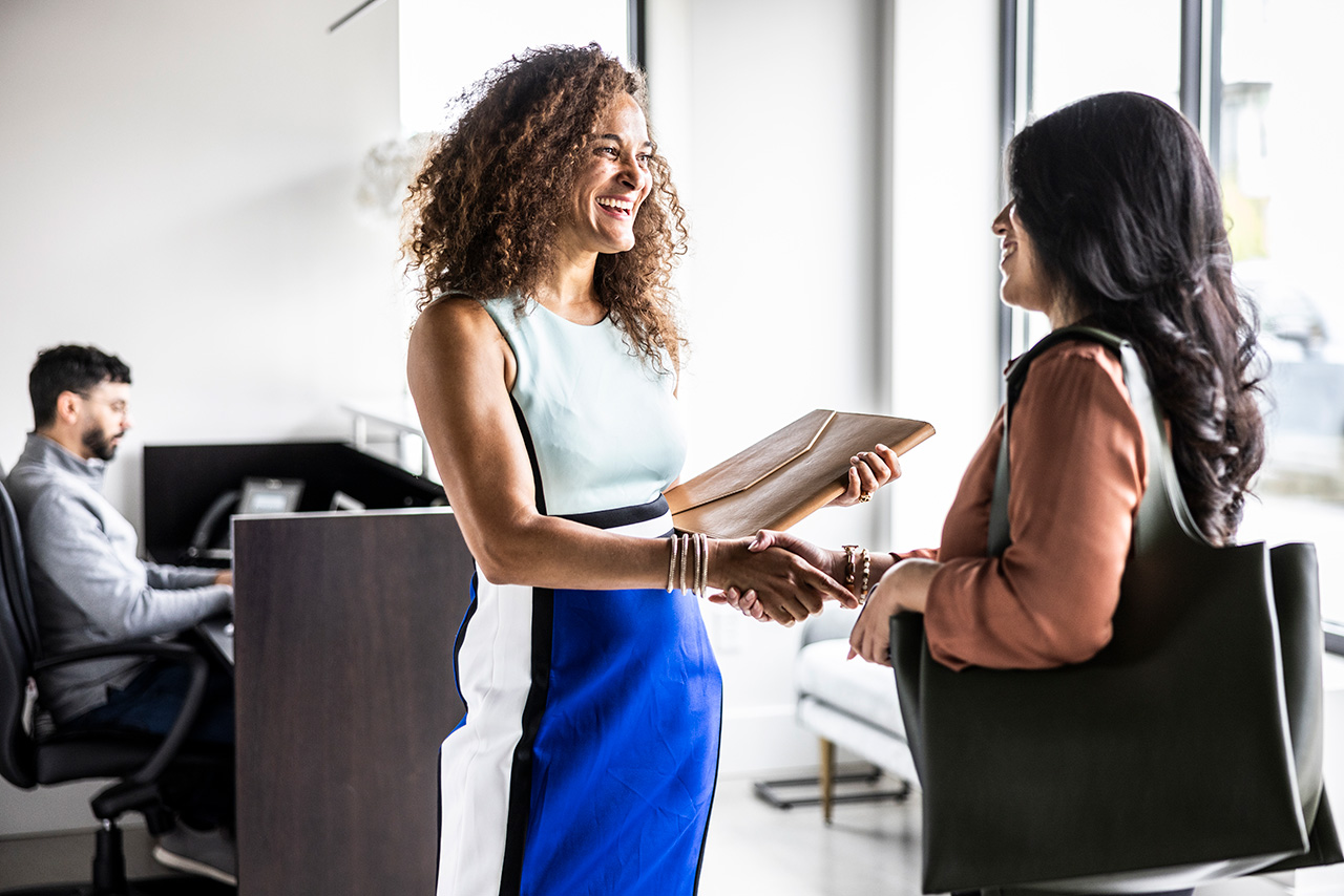 Two people meeting in a office