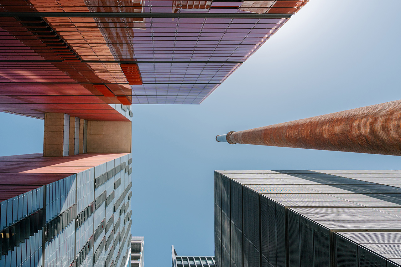Looking up at buildings and chimney