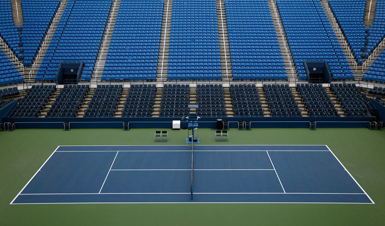 Tennis court in an empty arena