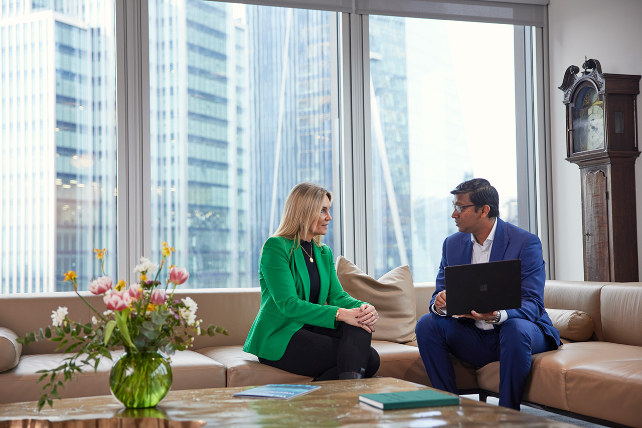 Two people talking in an apartment