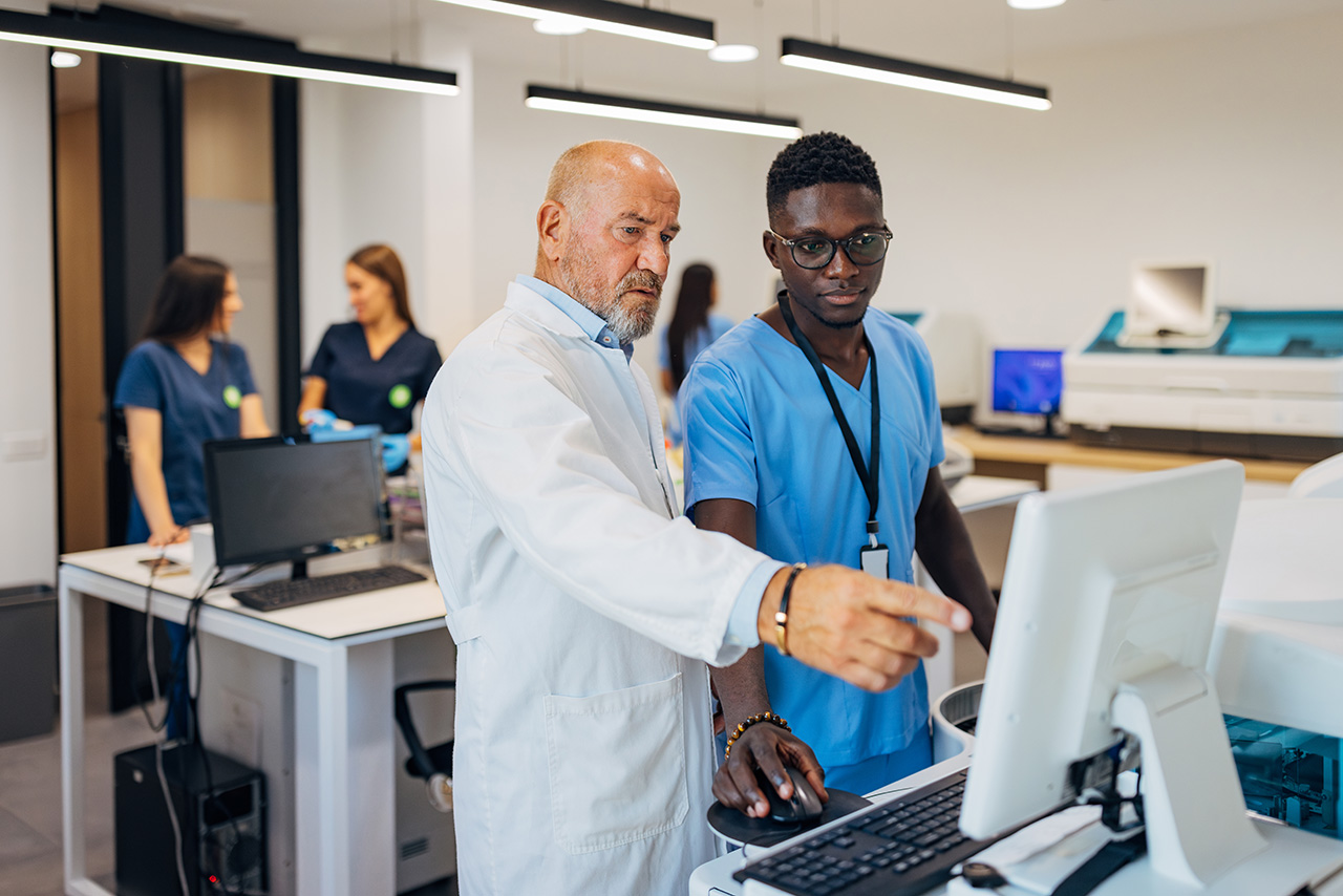 Medical staff working at a terminal