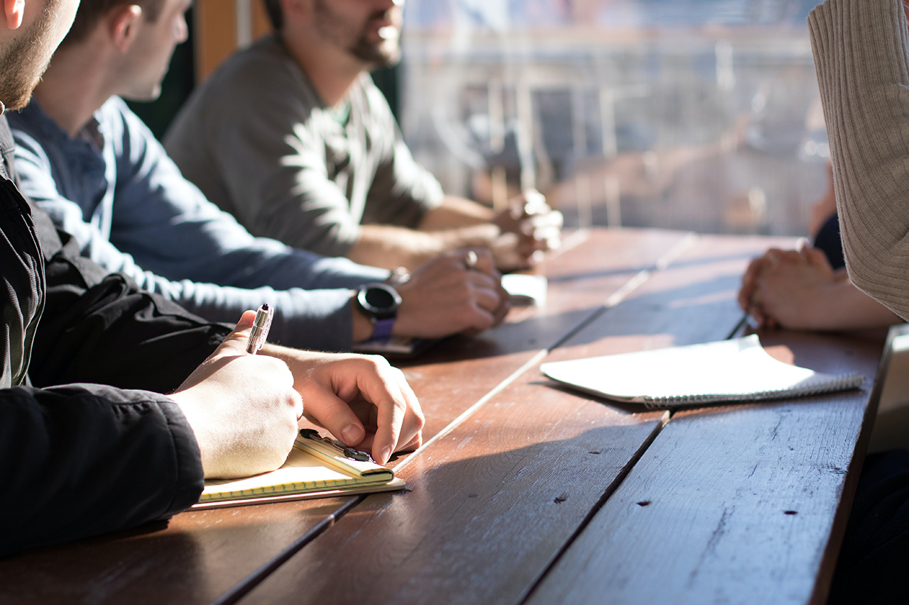 Close up of hands in a meeting