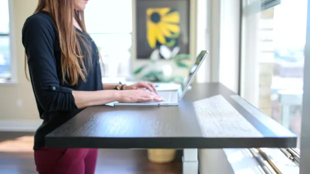 Woman at standing desk